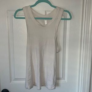 Off white Fabletics tank top. Super comfy to workout in. Worn only a few times